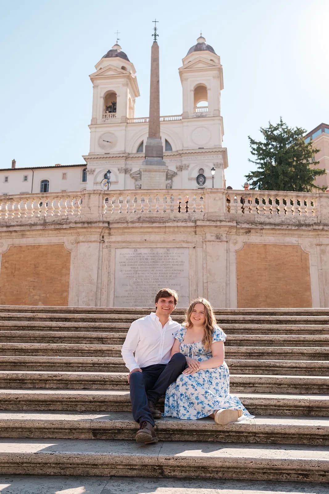 Gavin and Ally sitting together on the Spanish Steps below the church of Trinità dei Monti